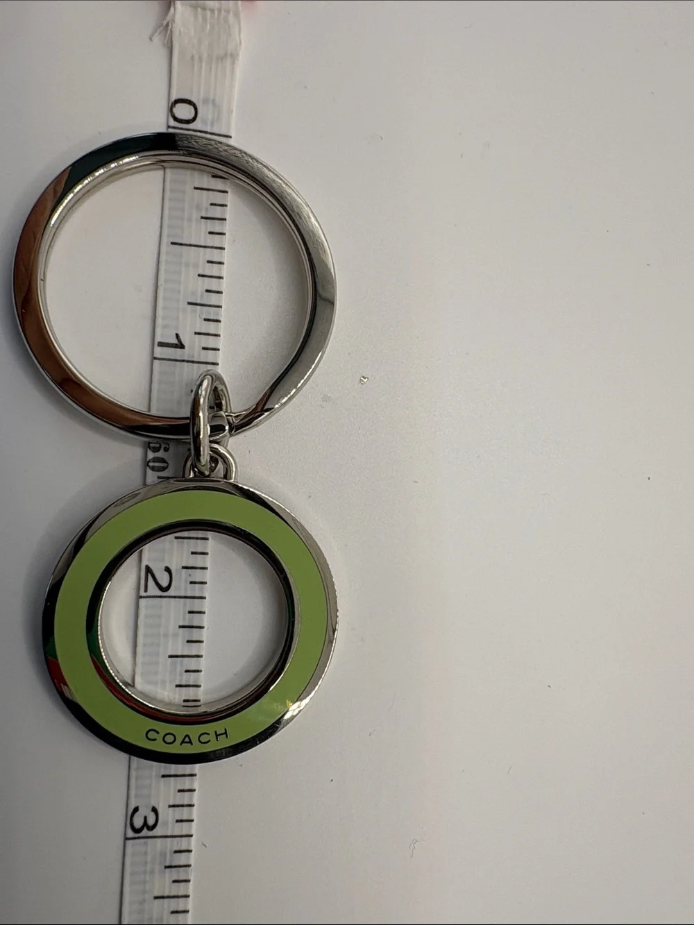 Coach Silver Keyring with Light Green Enamel Circle